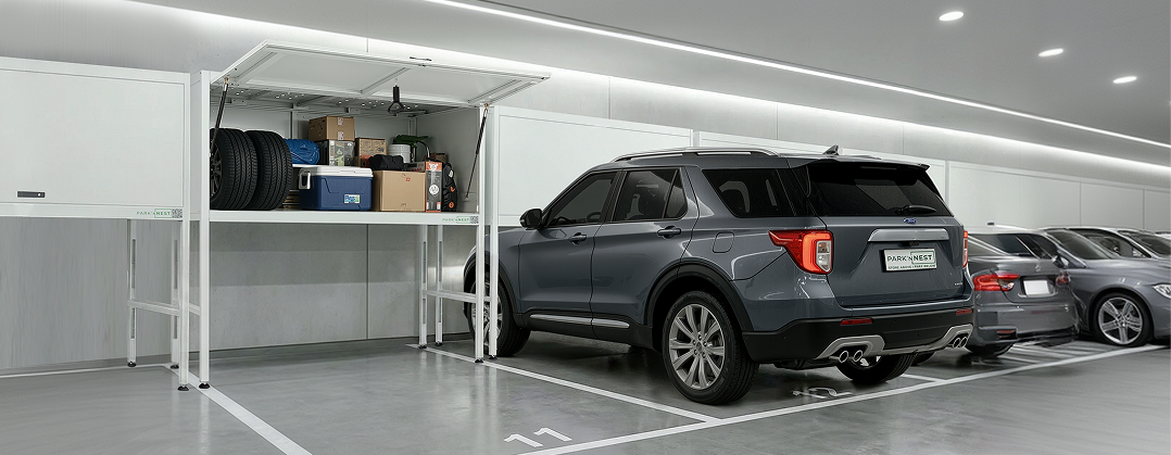 SUV parked in a residential garage with overhead storage system installed